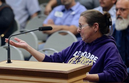 Susie Banuelos asks a question during the Monday night meeting.